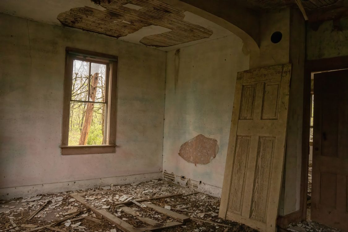 Room needing substantial repairs; illustrative stock photo, not an SC client property